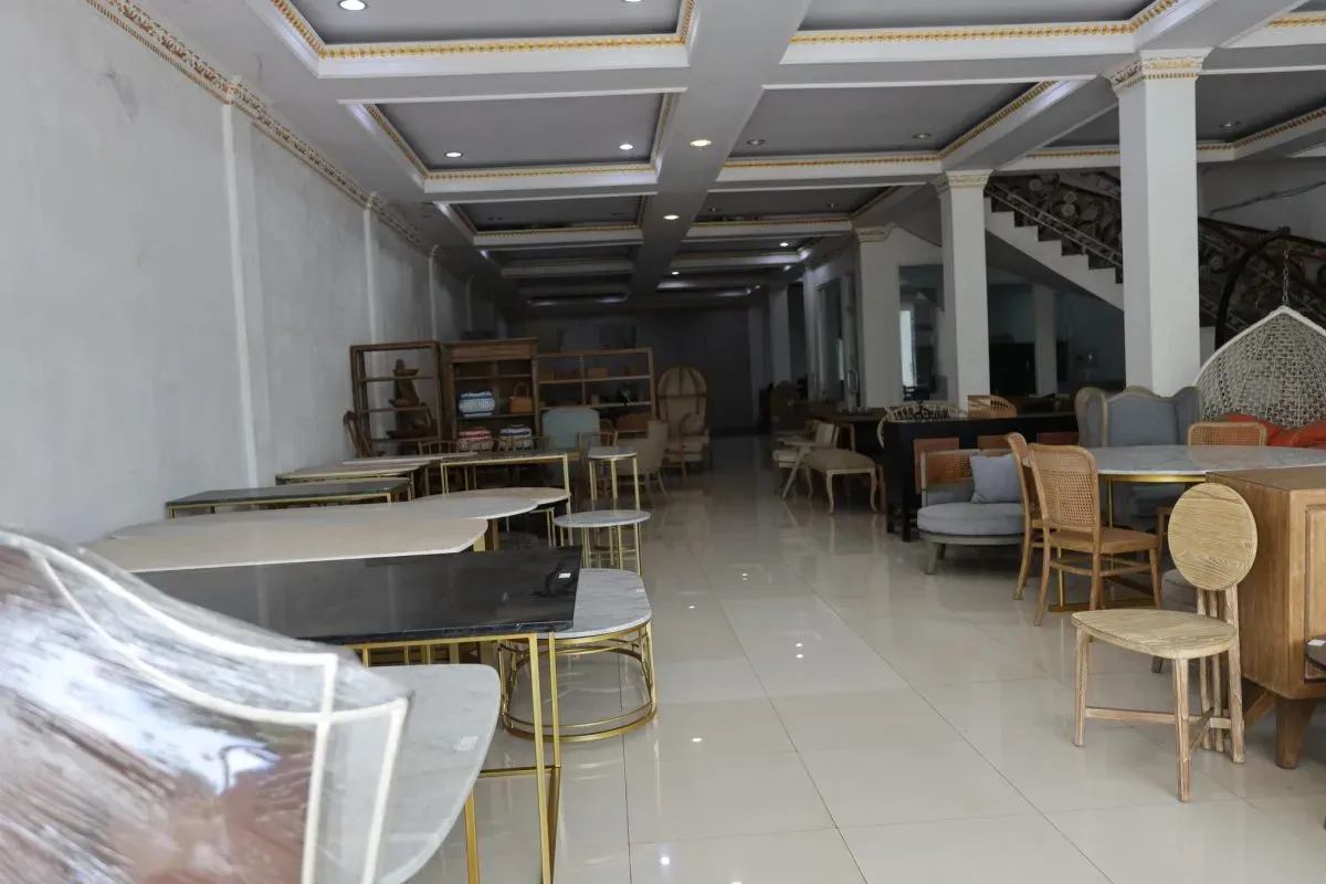 Modern furniture showroom with tables and chairs