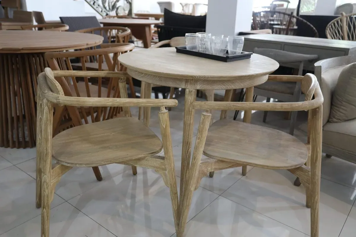 Wooden round table with two matching chairs