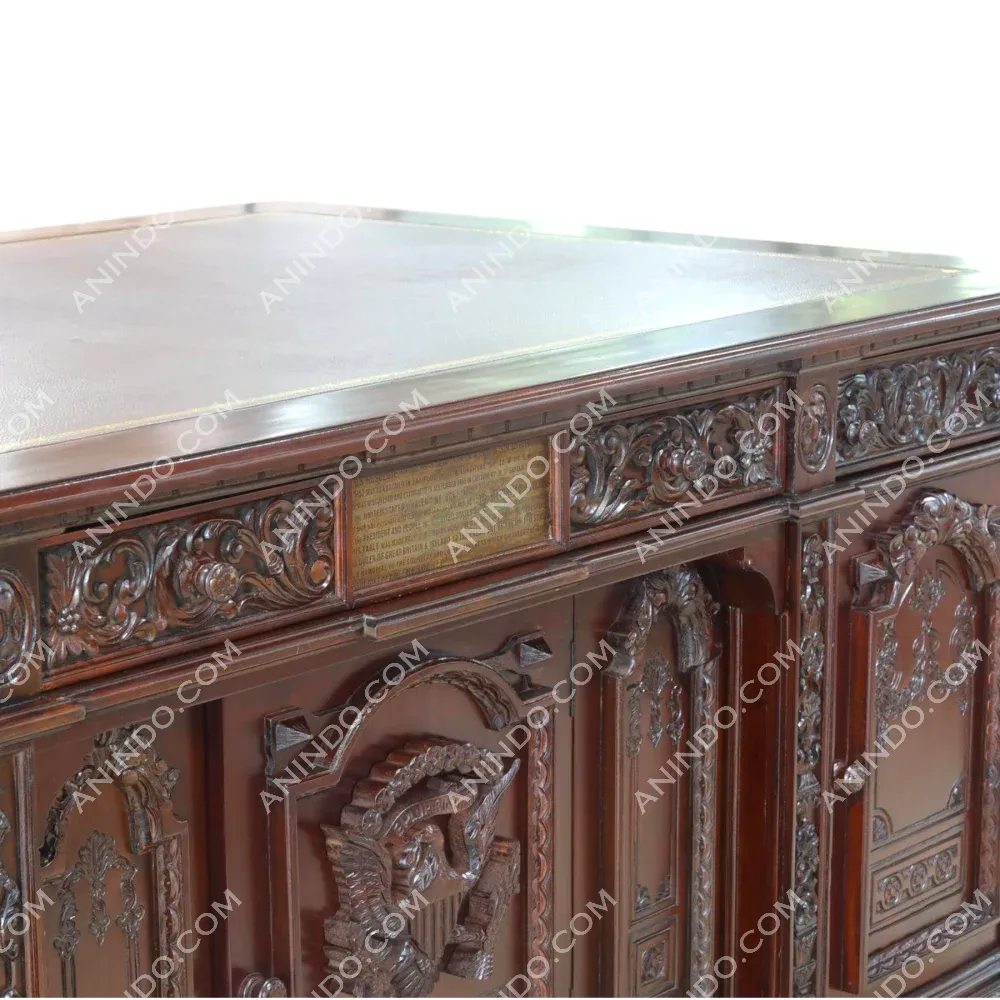 Ornate carved wooden office desk with detailed patterns