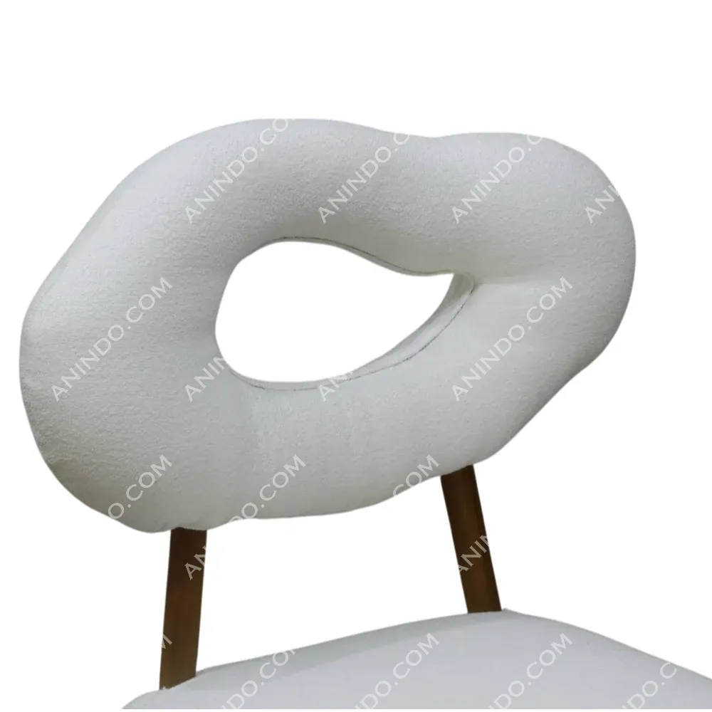 Modern white chair with unique circular backrest