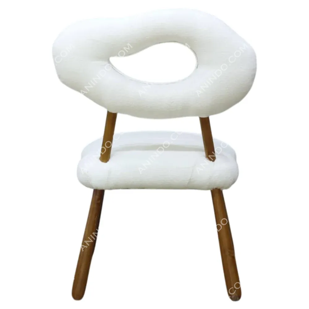 Modern white cushioned chair with wooden legs
