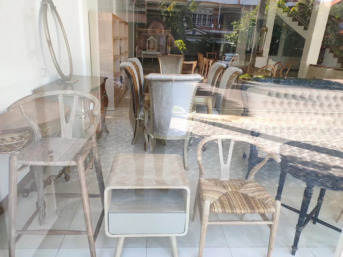 Vintage furniture displayed in a store window