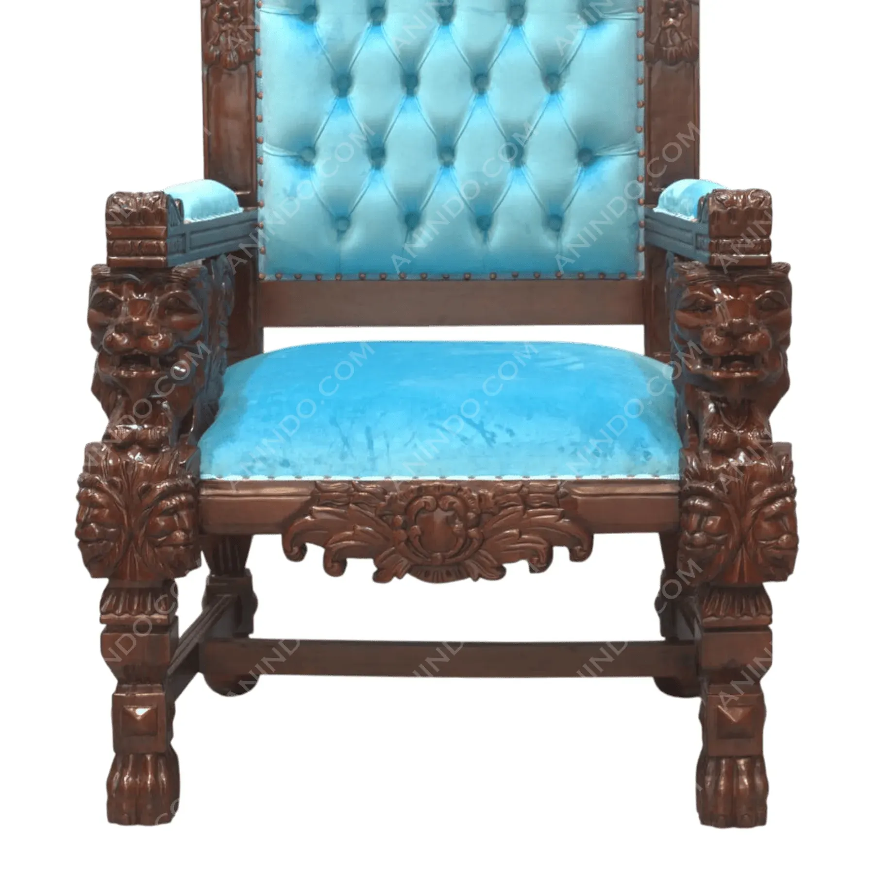 Ornate wooden chair with blue velvet upholstery