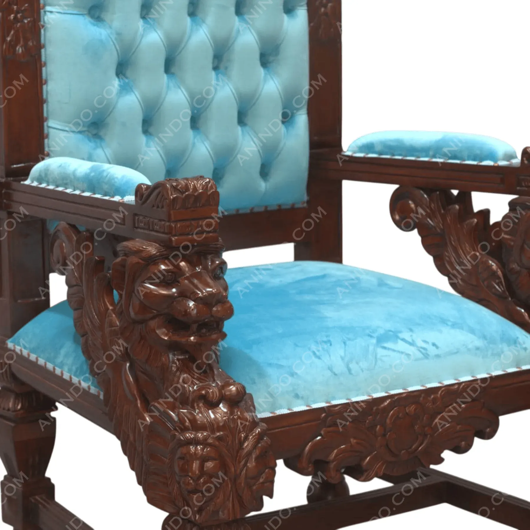 Ornate wooden chair with blue velvet upholstery