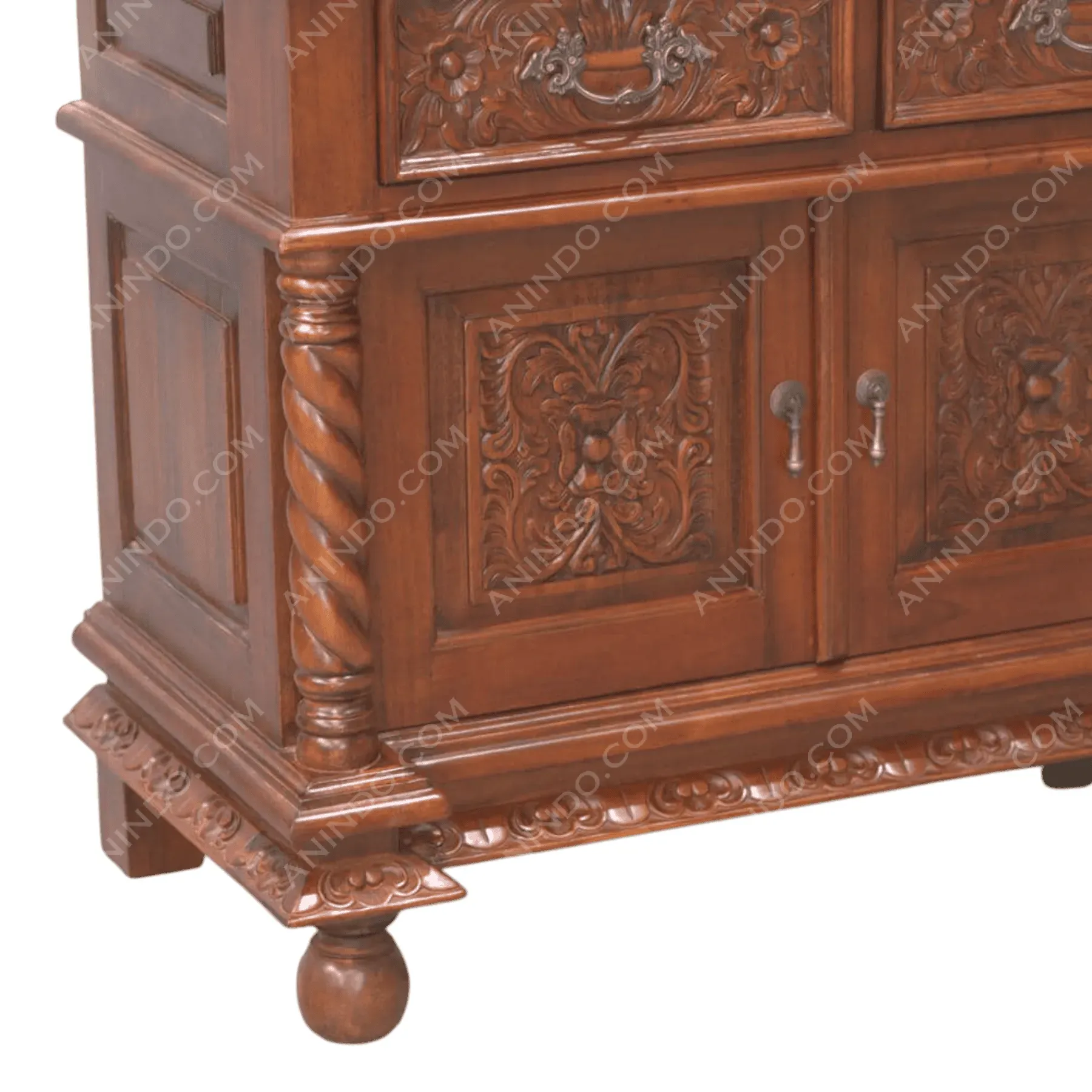 Ornate carved wooden cabinet with floral details
