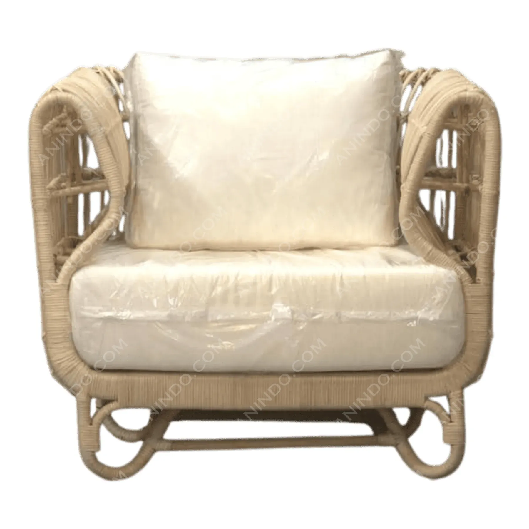 Beige rattan armchair with white cushions