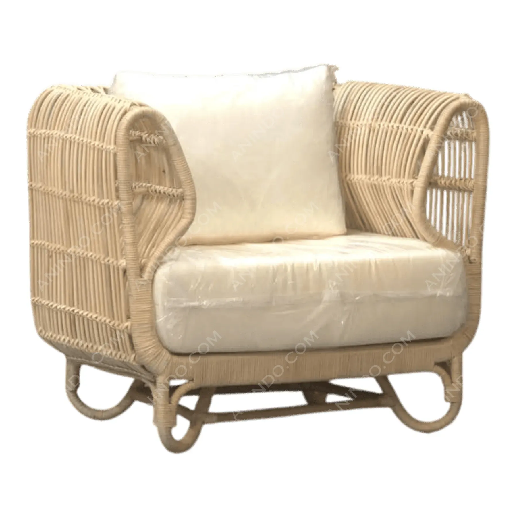 Beige rattan armchair with cream cushions