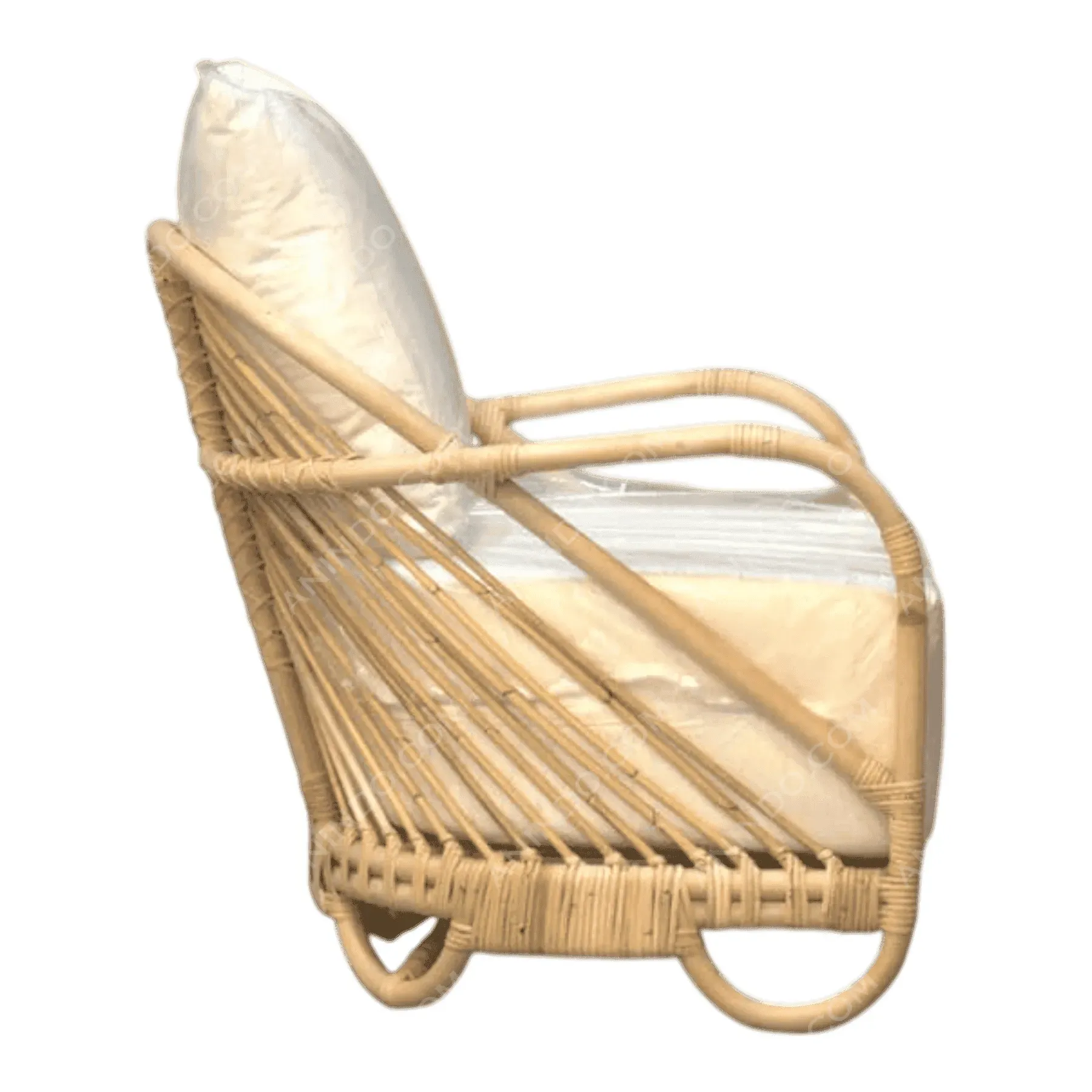 Rattan lounge chair with white cushions