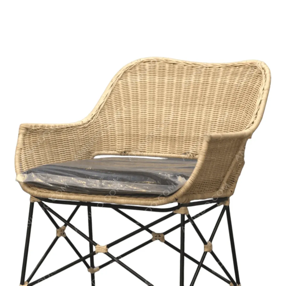 Stylish wicker chair with cushion on black legs.