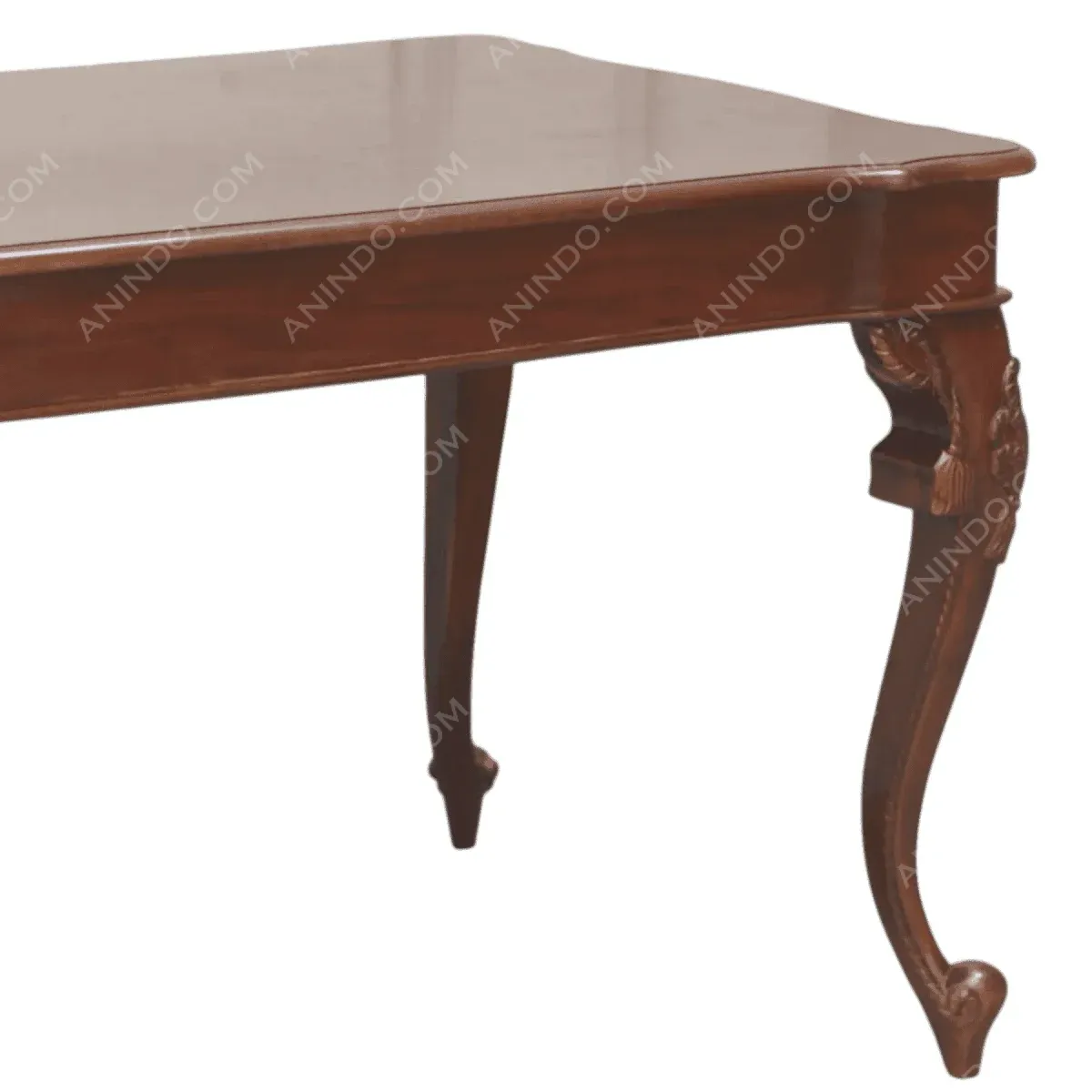 Elegant wooden table with intricately carved legs.