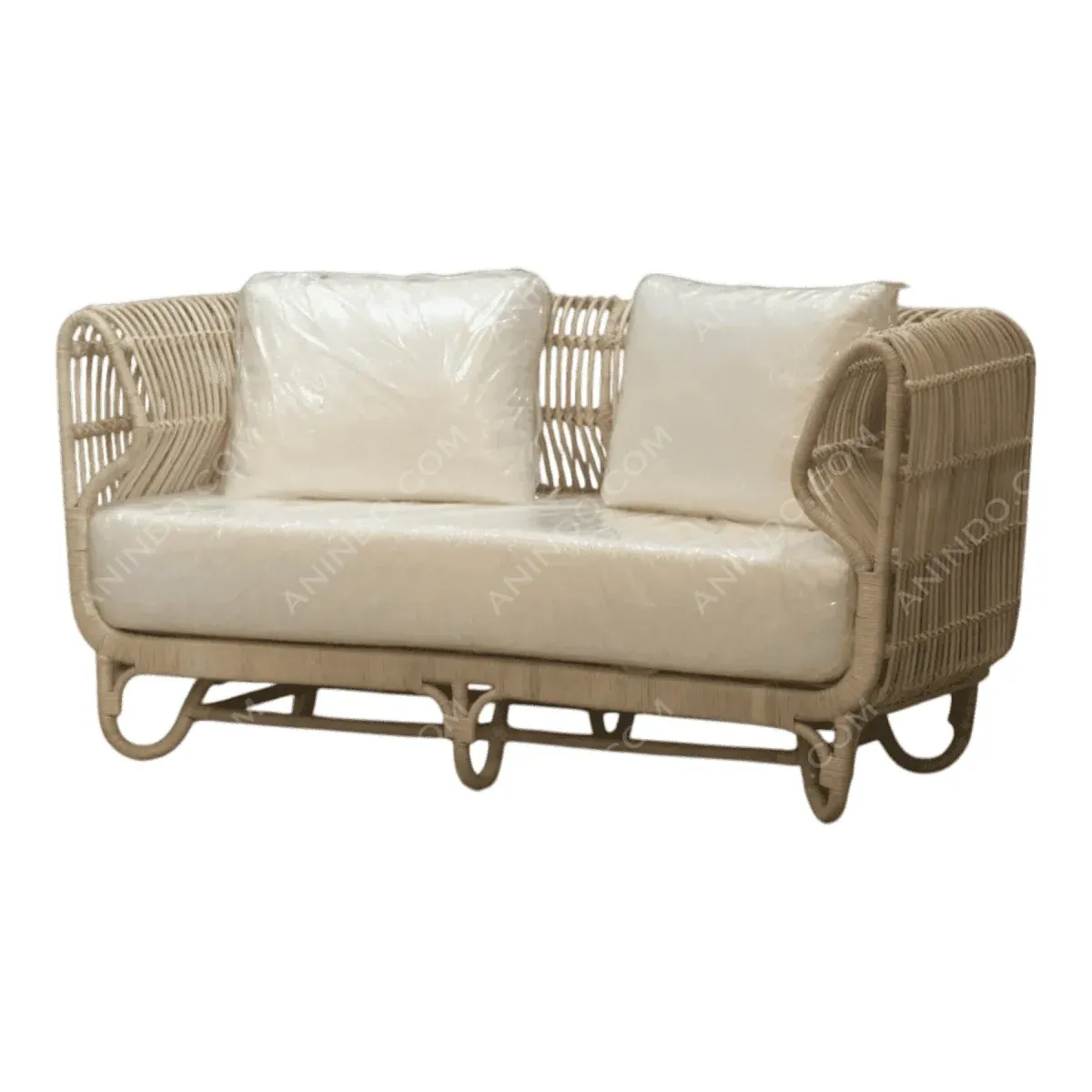 Stylish beige rattan sofa with plush cushions.