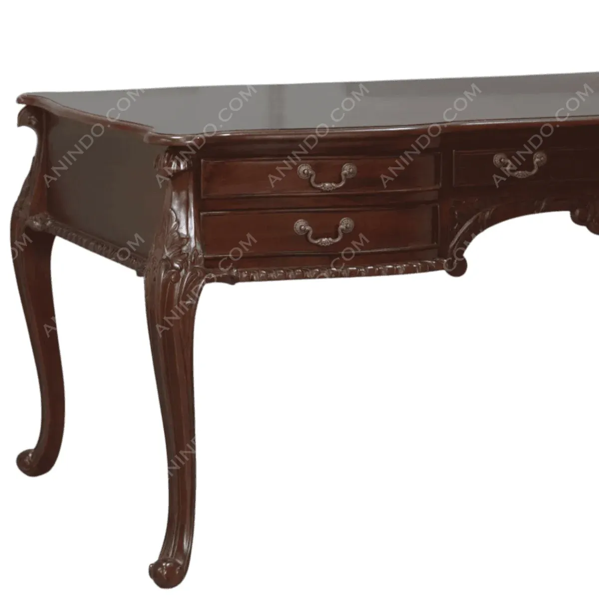 Elegant wooden desk with ornate detailing and drawers.