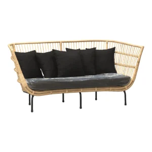 Stylish wicker sofa with black cushions