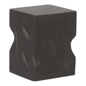 Black sculptural block with curved indentations