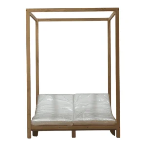 Minimalist wooden bed frame with white cushions.