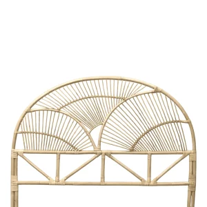 Stylish rattan headboard with curved design.