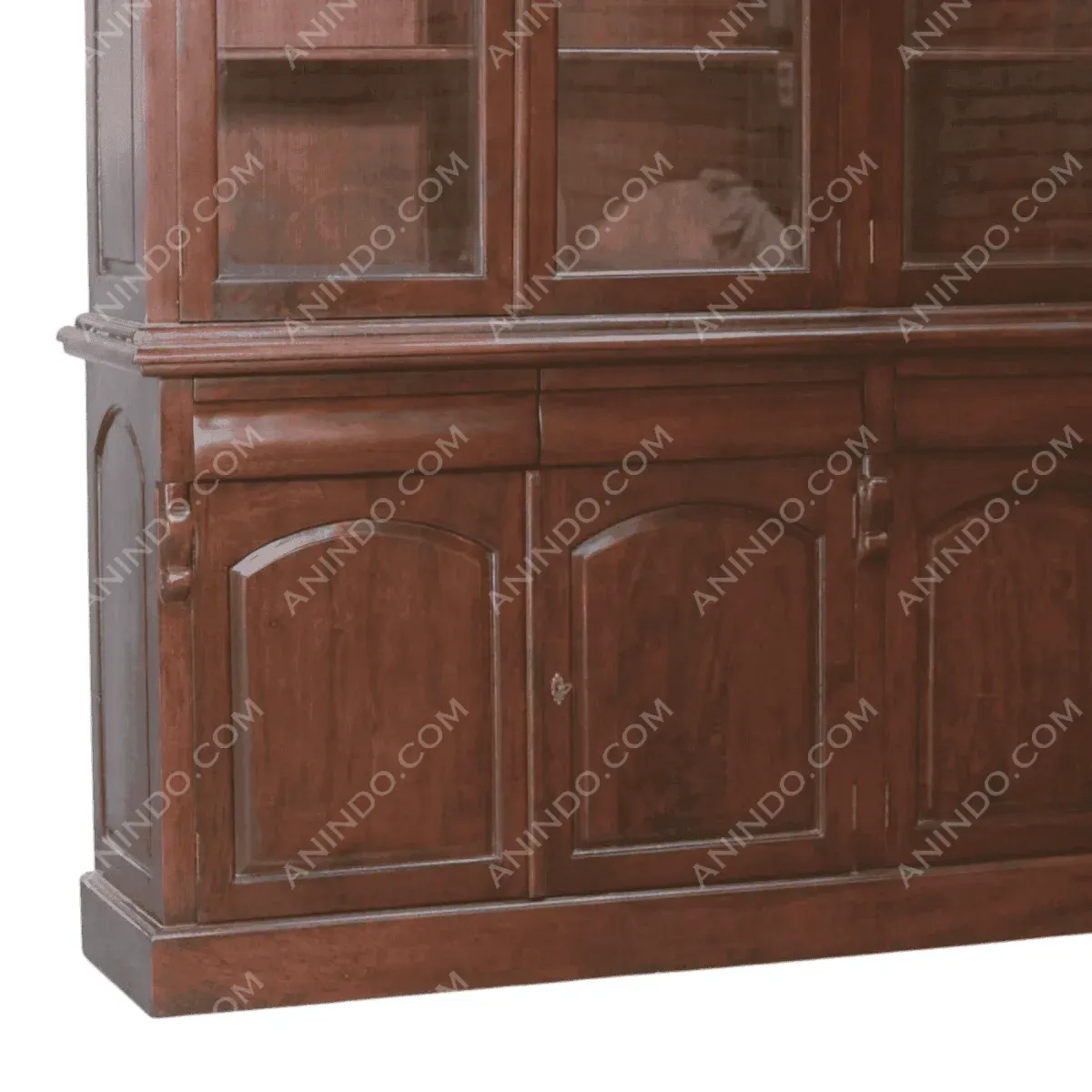 Wooden cabinet with glass doors and decorative details.
