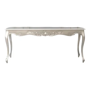 Elegant silver console table with intricate design.
