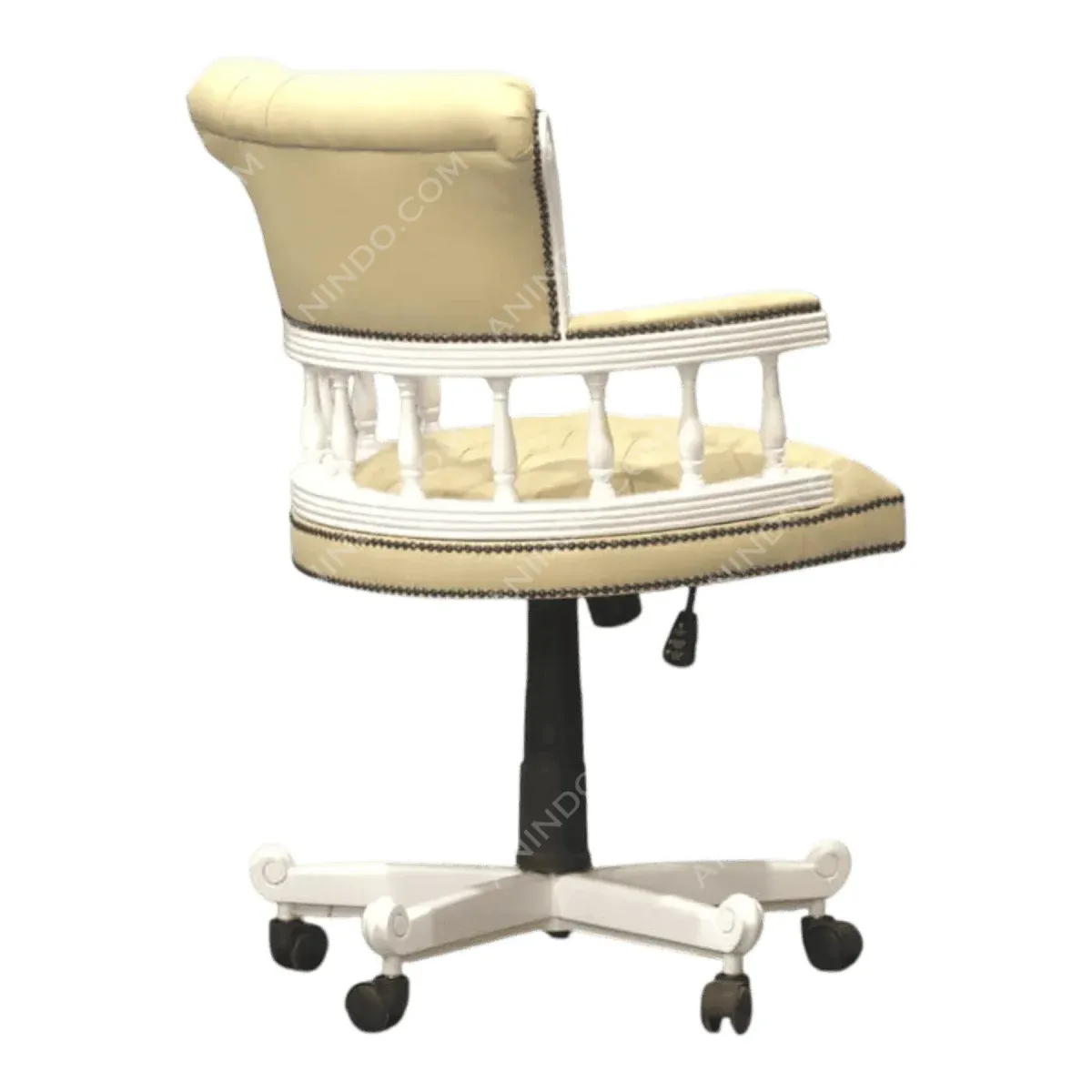 Elegant swivel chair with soft cream upholstery.