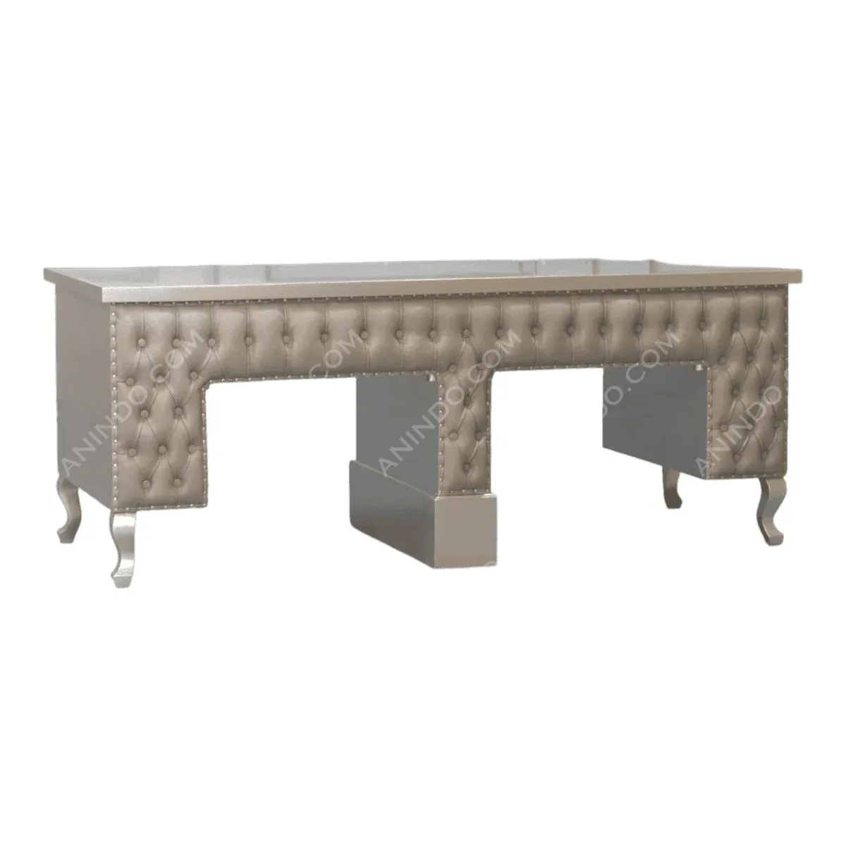 Elegant tufted silver desk with decorative legs.