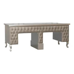 Elegant tufted silver desk with decorative legs.