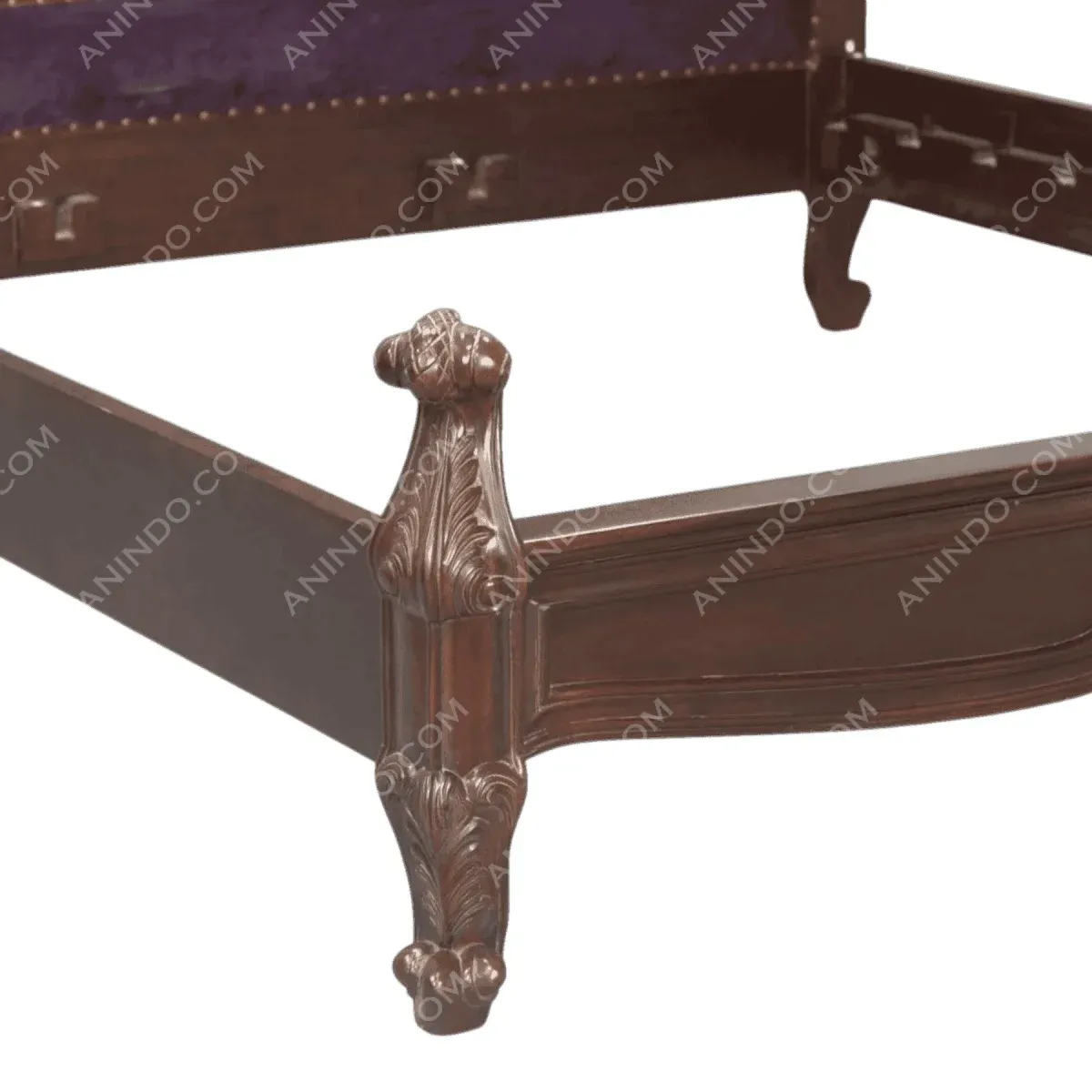 Close-up of ornate wooden bed frame corner