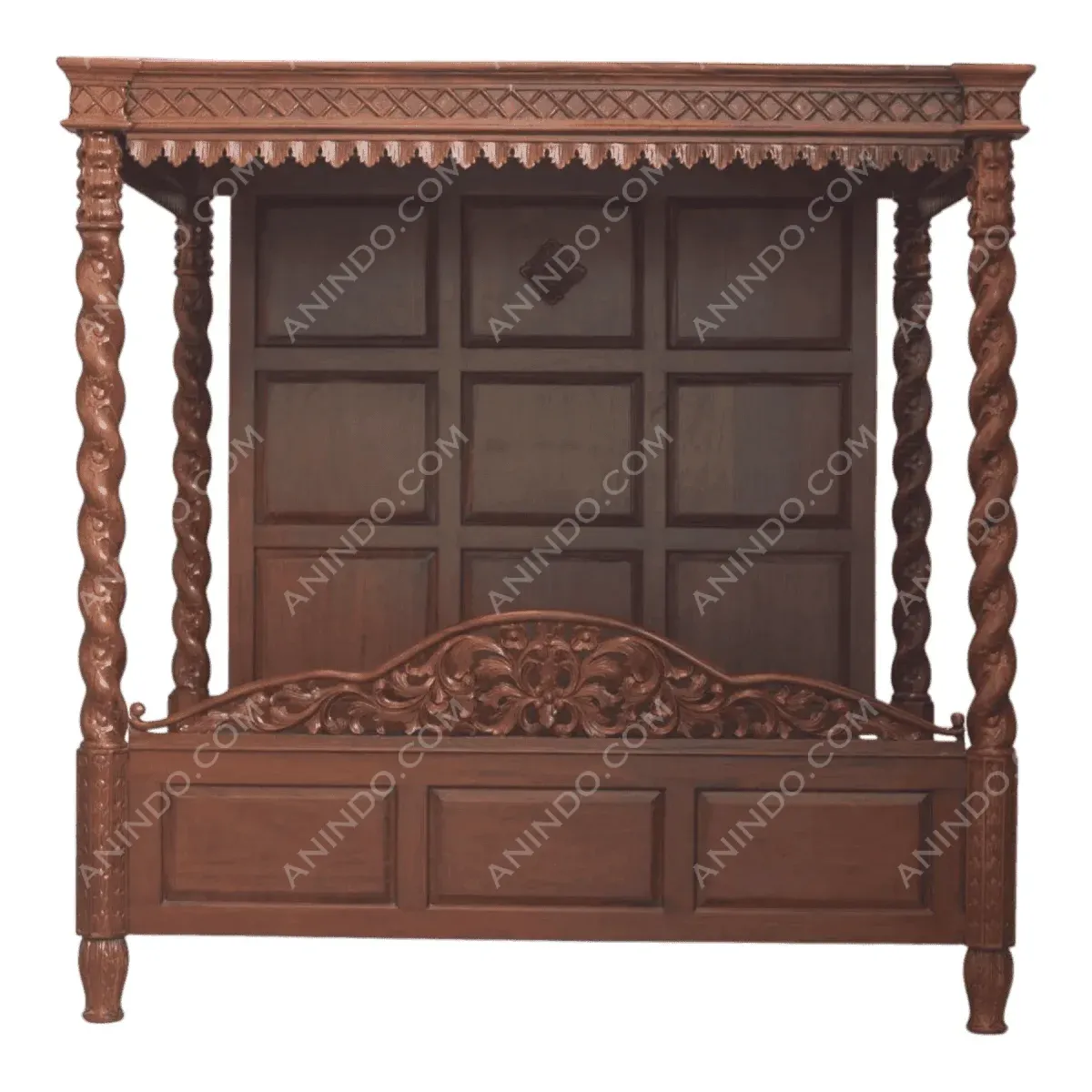 Intricately carved wooden bed with a canopy.