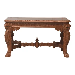 Intricately carved wooden table with lion details.