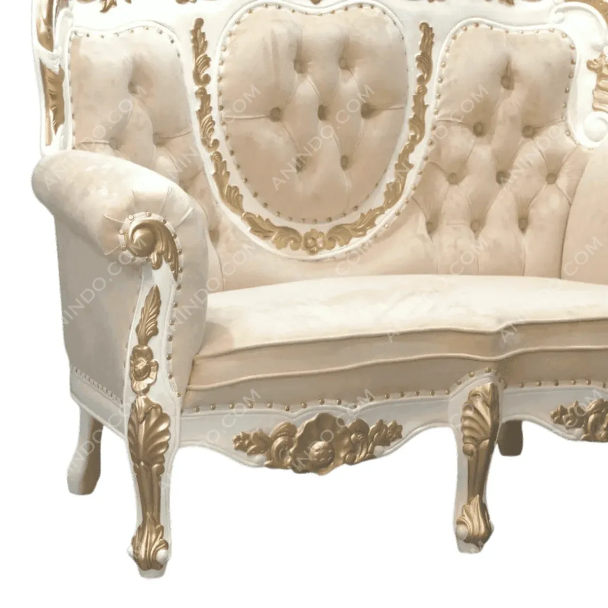 Elegant vintage sofa with gold detailing and upholstery.