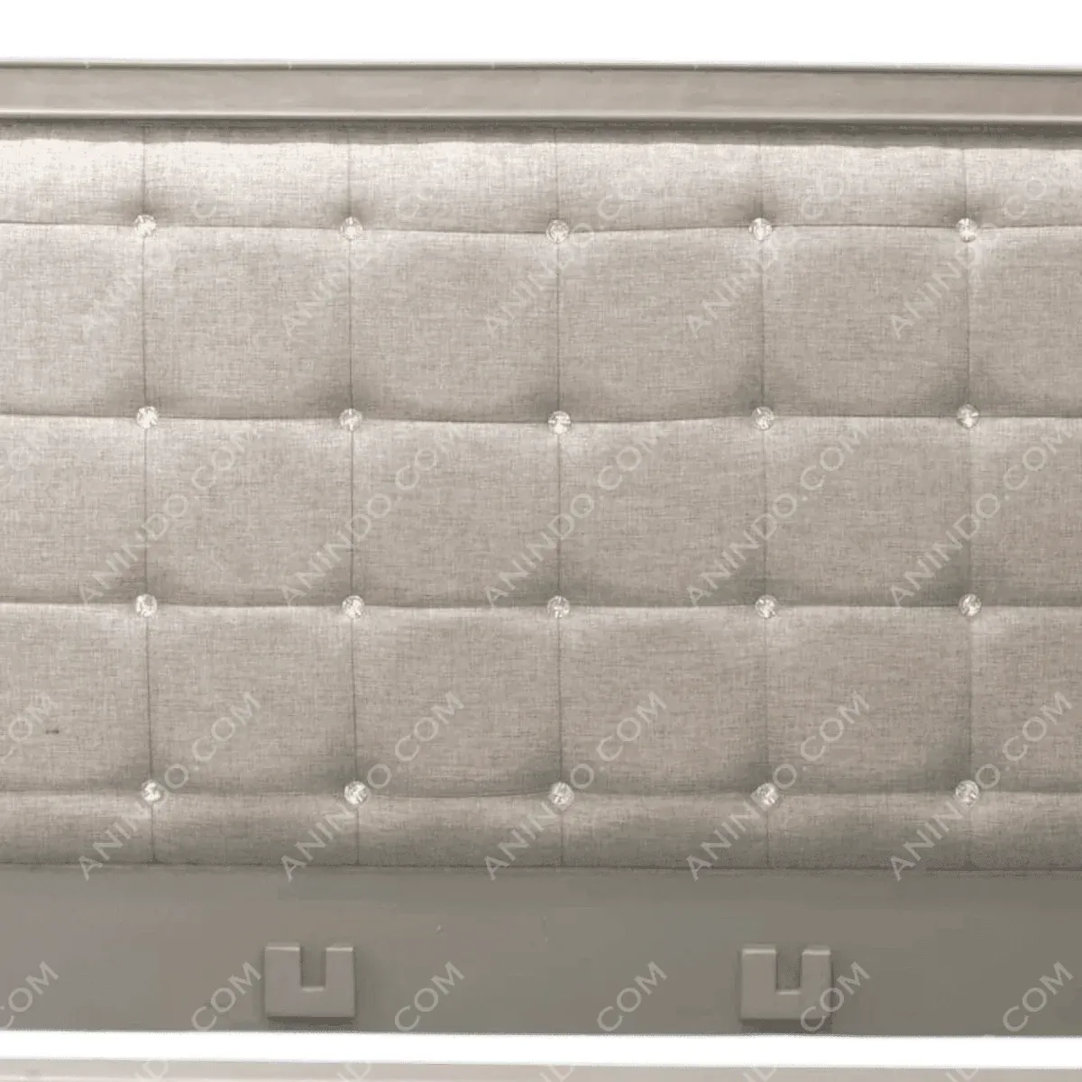 Elegant tufted headboard in soft gray fabric.