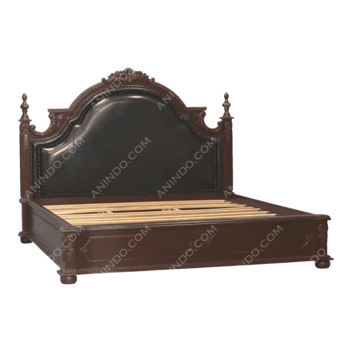 Elegant dark wood bed with ornate headboard design.