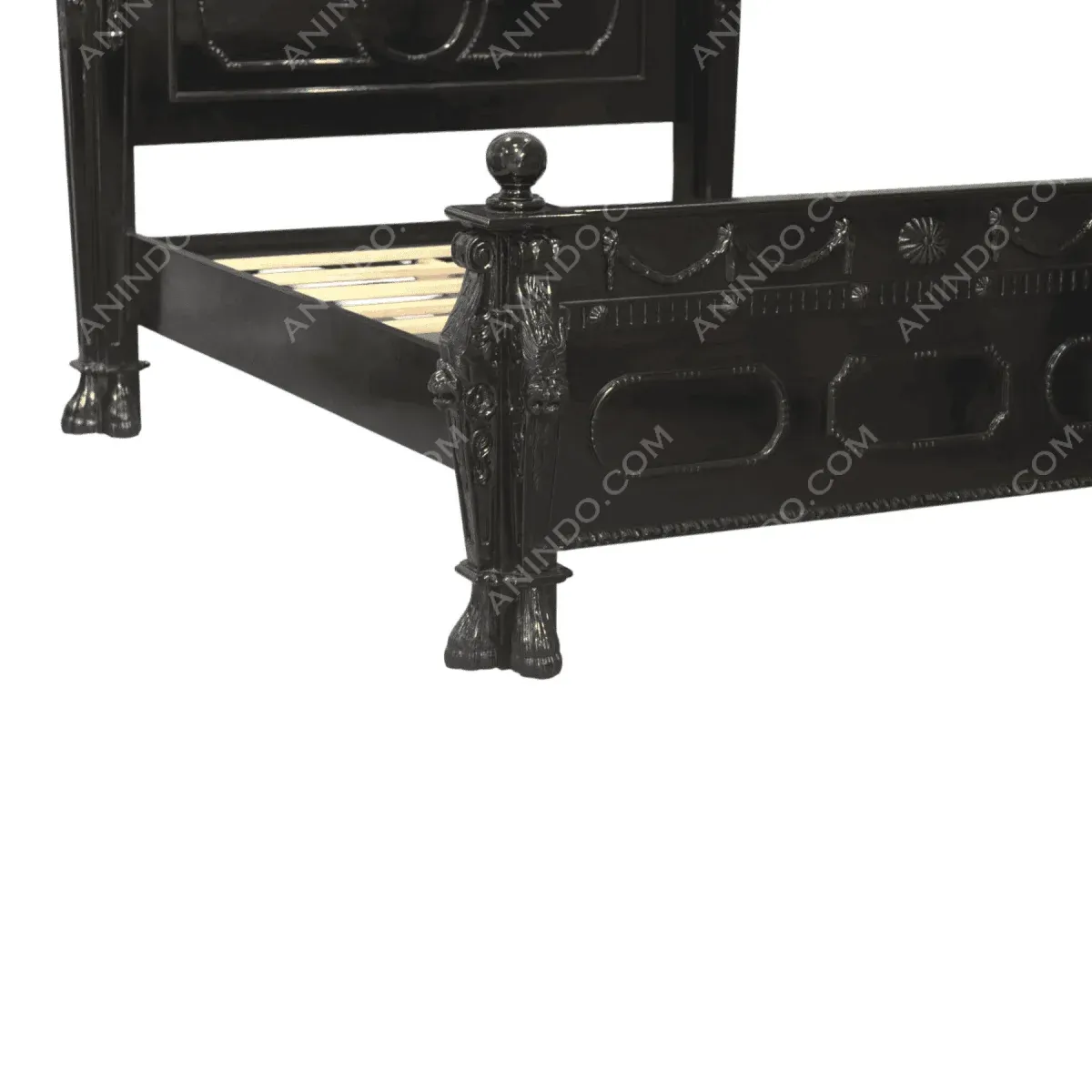 Elegant black wooden bed frame with detailed carvings.