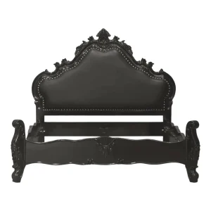 Ornate black bed frame with decorative detailing