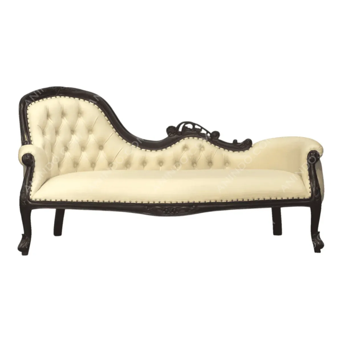 Elegant cream chaise lounge with ornate wooden details