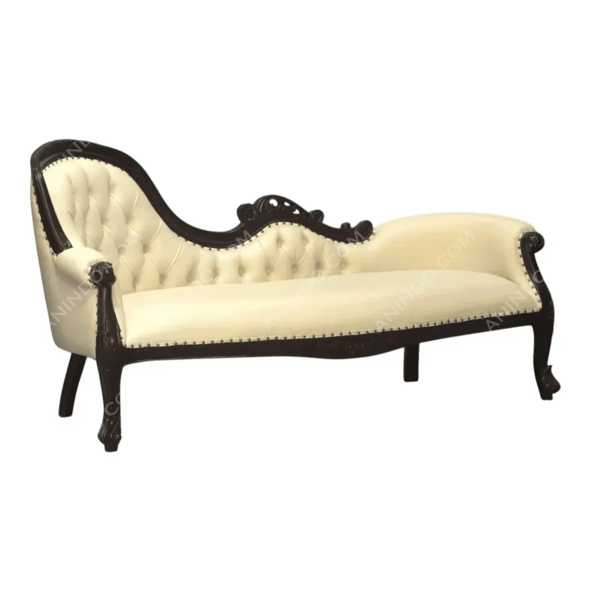 Elegant vintage tufted cream sofa with dark wood framing.