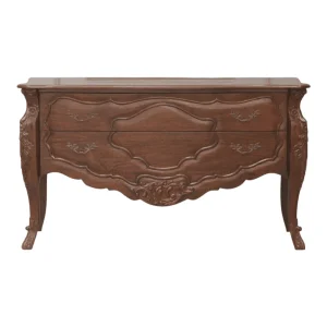 Elegant wooden dresser with intricate carvings.