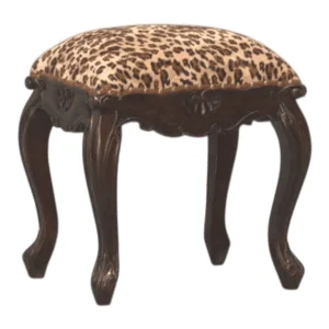 Vintage stool with leopard print upholstery.
