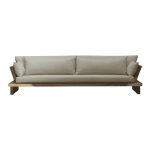 Modern beige sofa with plush cushions and wooden frame.