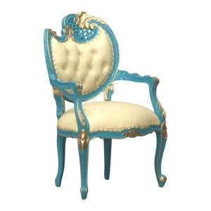 Blue and gold ornate armchair with cream upholstery.