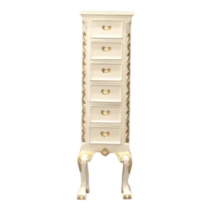 Tall vintage dresser with gold accents.