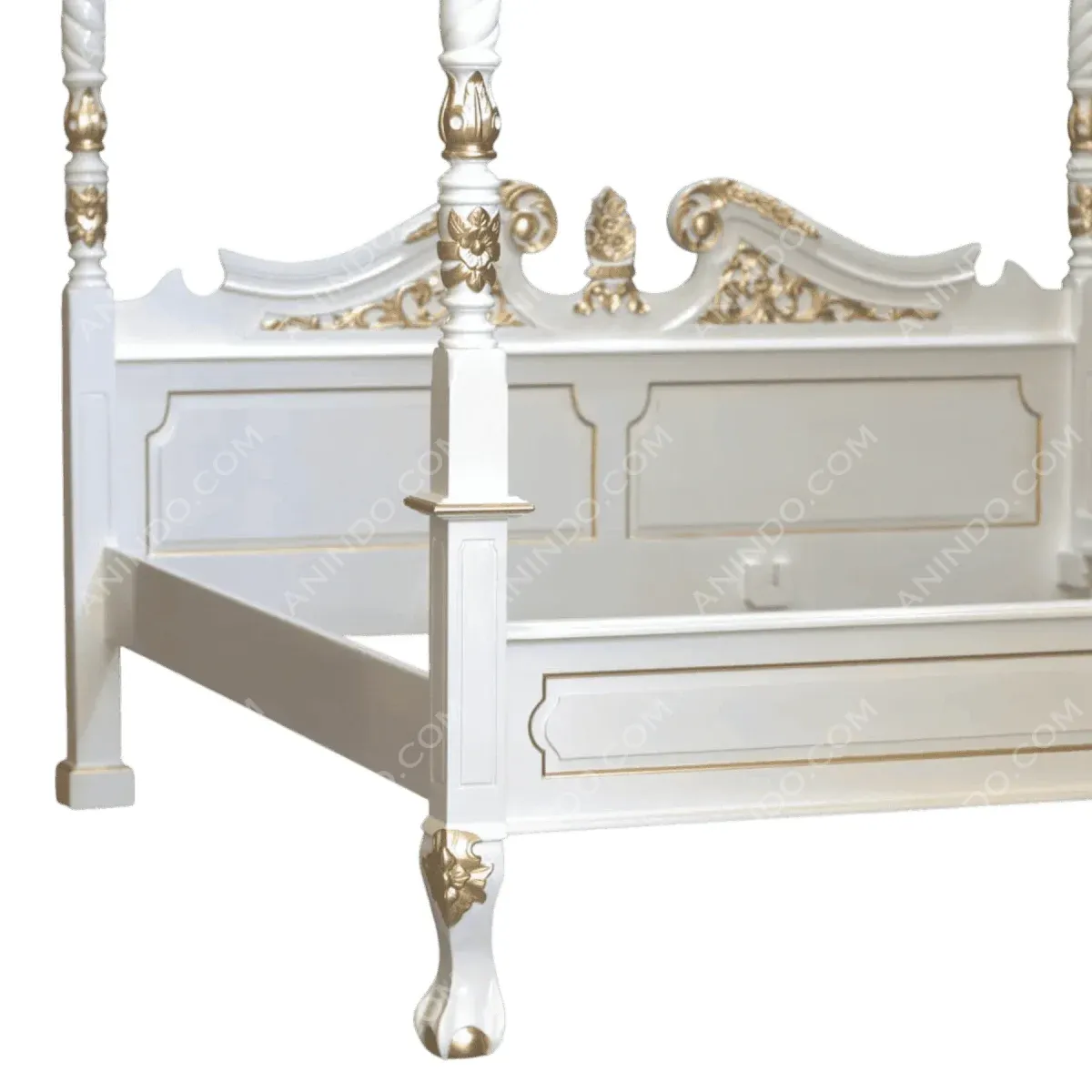 Elegant white four-poster bed with gold accents.