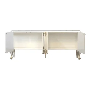 Elegant white cabinet with decorative legs and doors