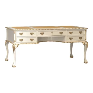 Elegant white and gold desk with ornate details.