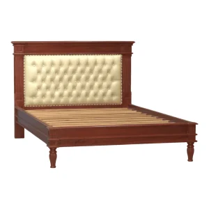 Elegant wooden bed with tufted headboard.