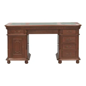 Traditional wooden desk with multiple drawers.