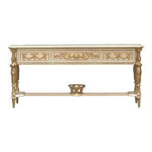 Ornate golden table with decorative carvings.