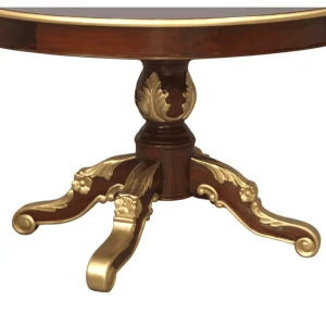 Ornate wooden table with golden accents