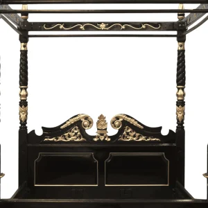 Elegant black and gold decorative bed frame design.