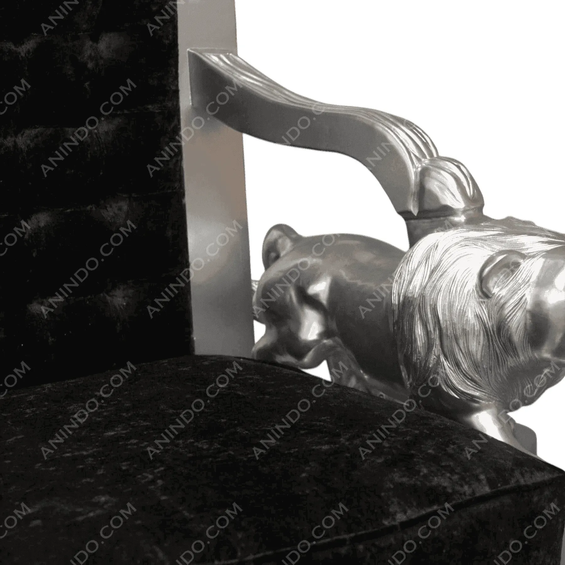 Black velvet chair with silver lion armrest