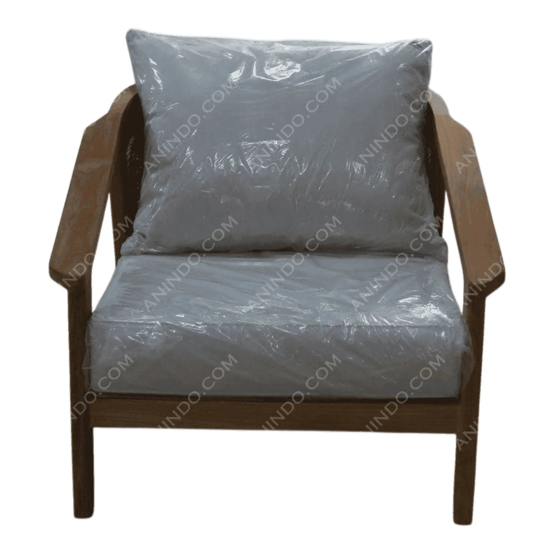 Wooden armchair with gray cushions wrapped in plastic